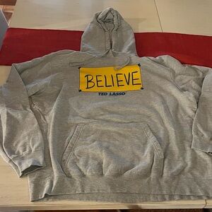 Unisex Ted Lasso-Inspired “Believe” Sign Hooded Sweatshirt extra Large Gray XL